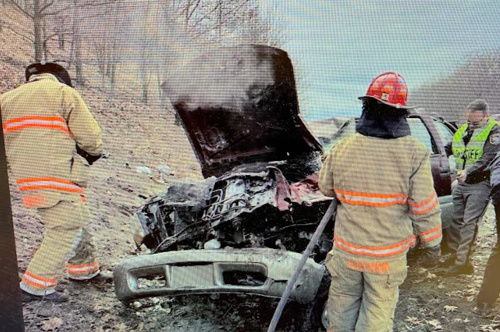 First responders save woman, man trapped inside burning SUV ...